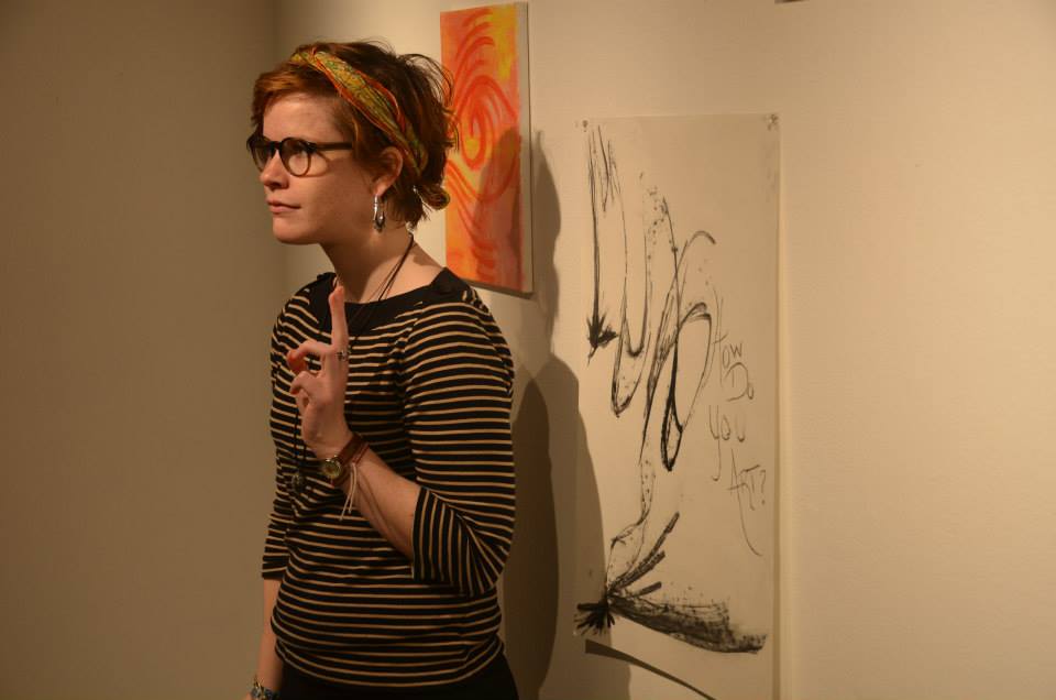 Natalia Dutt at the 'Collaborate' FORM Gallery in front of one of the pieces of artwork