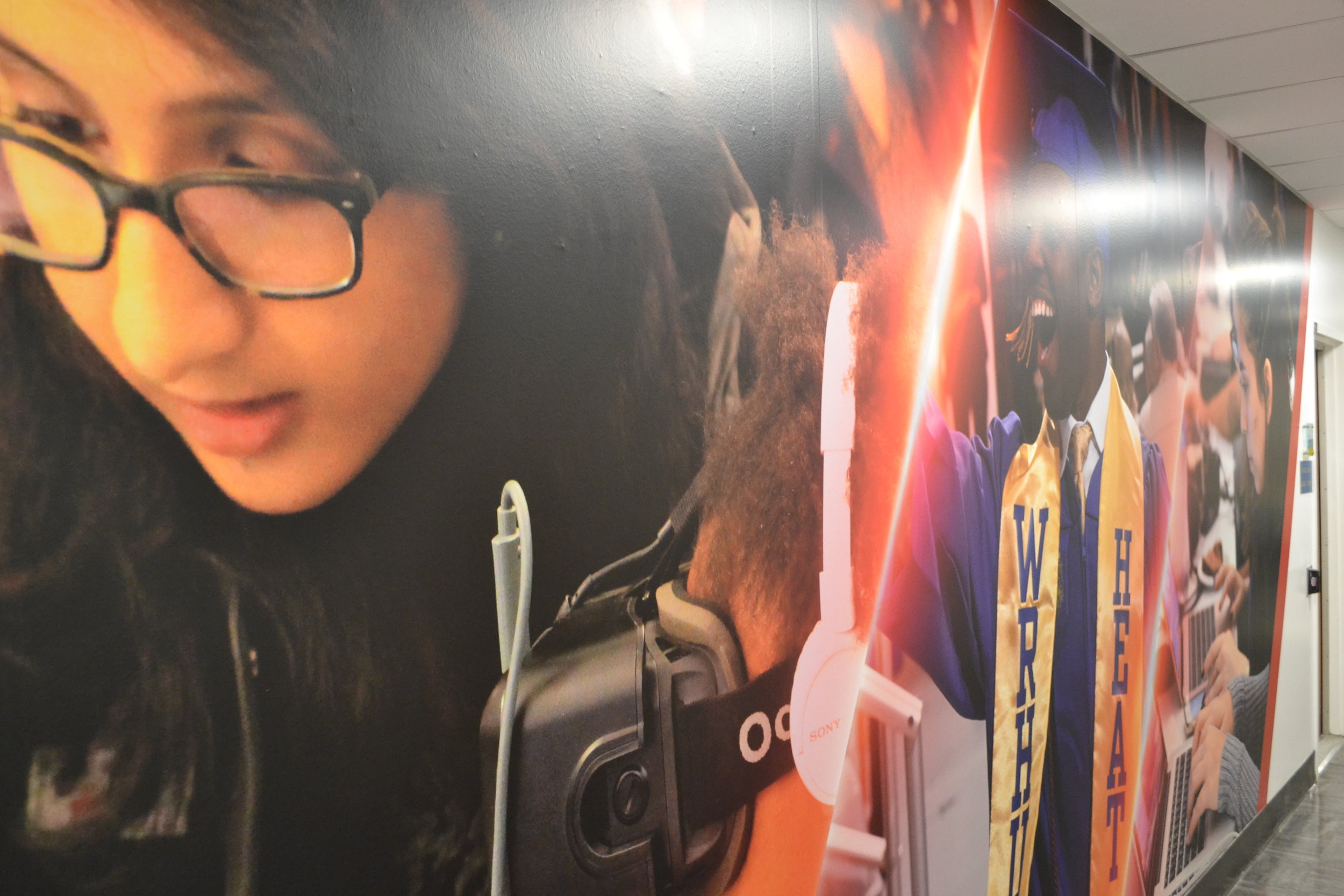  A new mural, part of the redecoration, shows students hard at work in various media organizations on campus.   Robert Kinnaird / The Hofstra Chronicle  