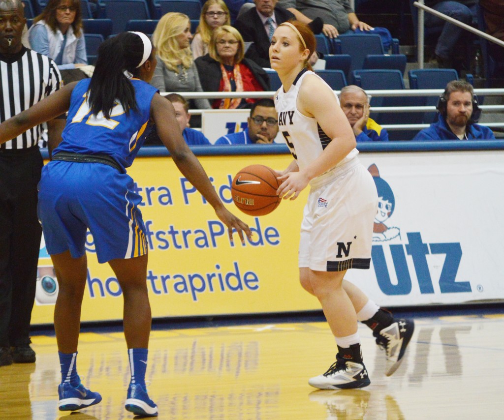 Jesse Saunders/The Chronicle Hofstra's Darius Faulk (12) awaits for the right time to steal the ball from Sarita Condie (5).