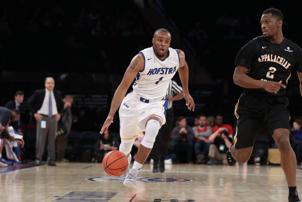 Cam Keough/The Chronicle Juan’ya Green (1) drives down the court past an Appalachian State defender during Sunday’s win at Madison Square Garden. 