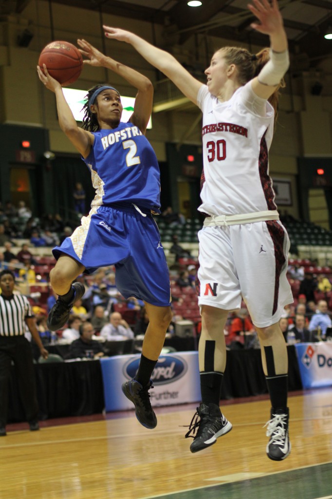 Despite a hard fall on her head, Candace Bond (2) helped lead Hofstra to a 57-52 quarterfinal win over Northeastern.