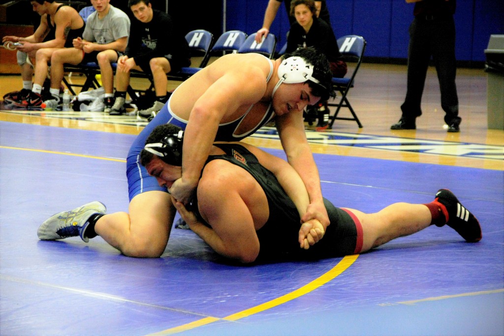 Mike Rudin/The Chronicle  Mike Hughes defeats his Bloomsburg opponent, Saul Wilkins,  for the 9-0 major decision. Hofstra posted a 2-0 record at home after the doubleheader.