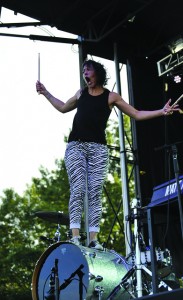  Photo Courtesy of University Relations. Kim Schifino of Matt and Kim stands on her drums during their set.