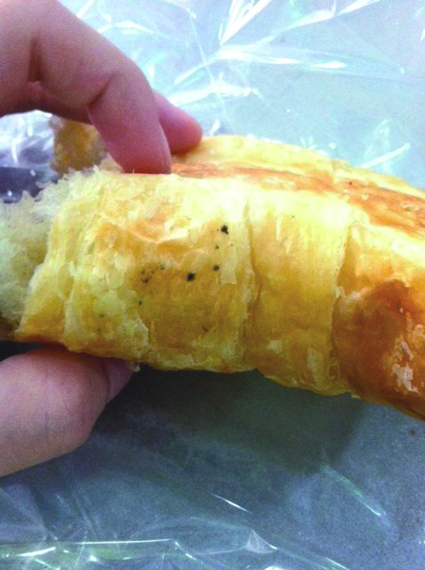 Julie Rafatpanah sent this photo of mold on a croissant bought at the Starbucks kiosk in the Student Center to the Department of Health in August. Photo Courtesy of Julie Rafatpanah